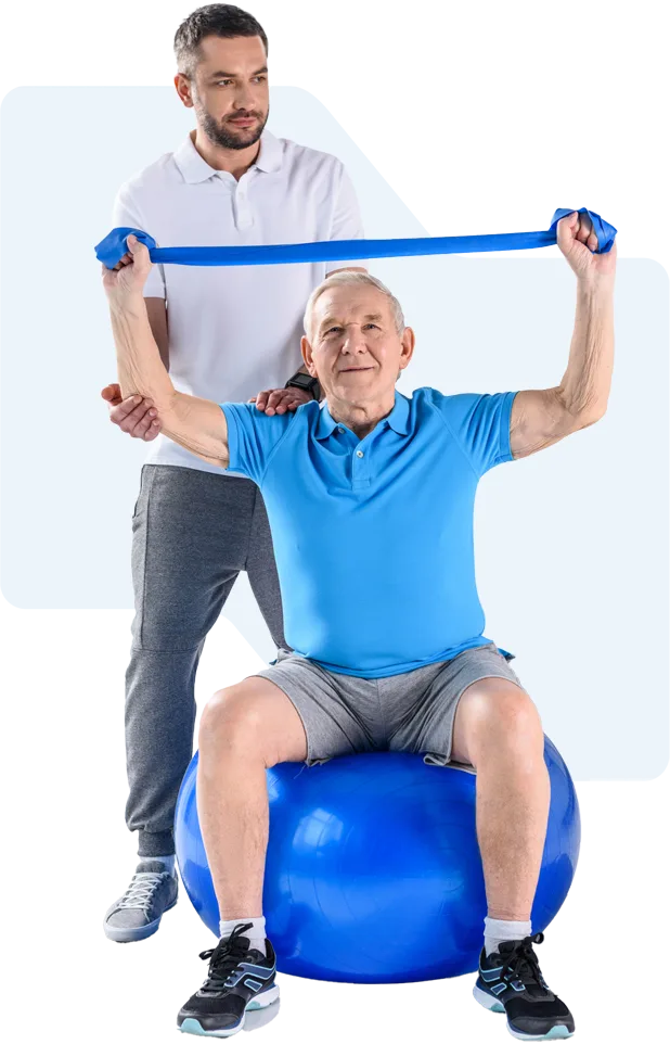 A clinician guiding a seated patient through a resistance-band exercise